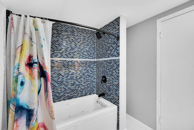 bathroom with shower / bathtub combination with curtain