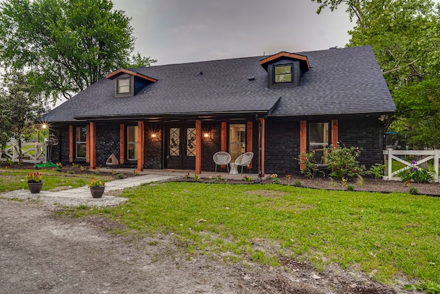 view of front of home with a front lawn