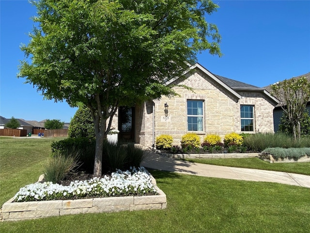 exterior space featuring a front lawn