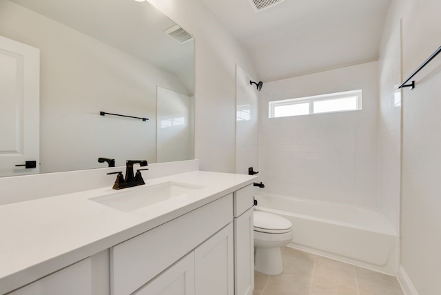 full bathroom featuring tile patterned floors, vanity, toilet, and bathtub / shower combination