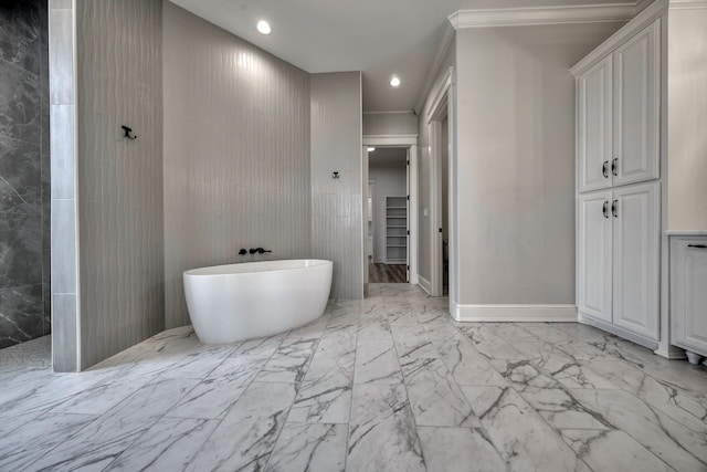 bathroom with crown molding and separate shower and tub