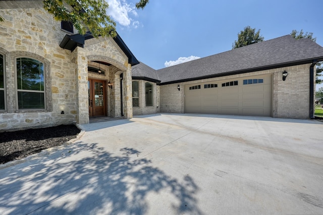 view of front of property featuring a garage