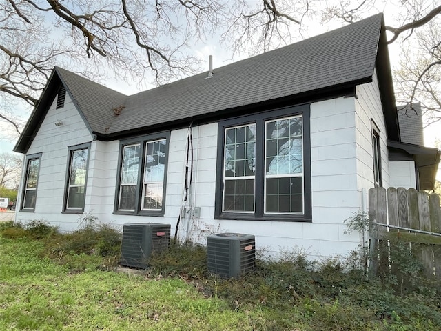 back of property with central AC unit