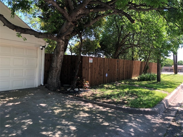 exterior space with a garage