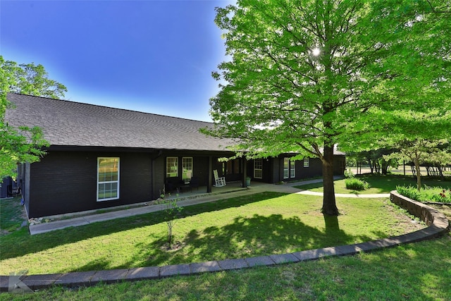 view of front of property with a front lawn