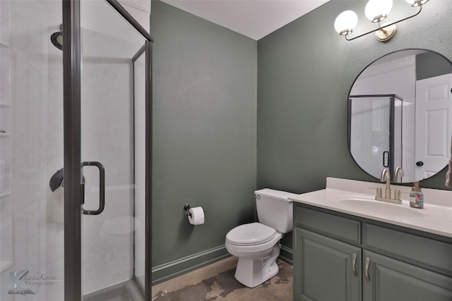 bathroom with tile flooring, vanity, an enclosed shower, and toilet