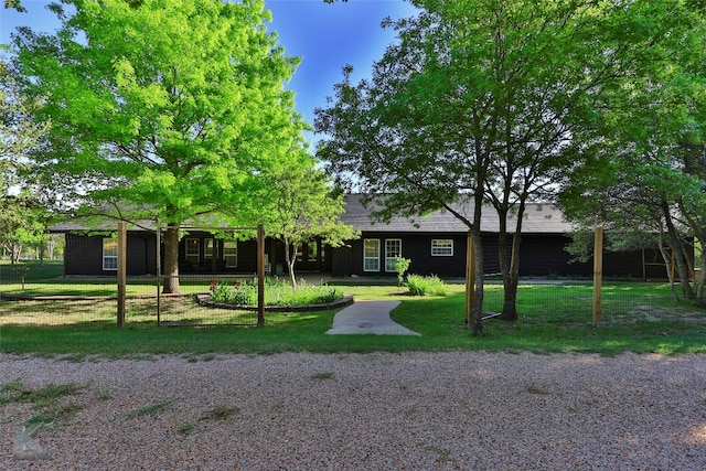 ranch-style house with a front yard