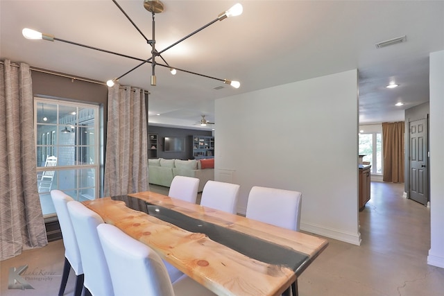 dining space with ceiling fan