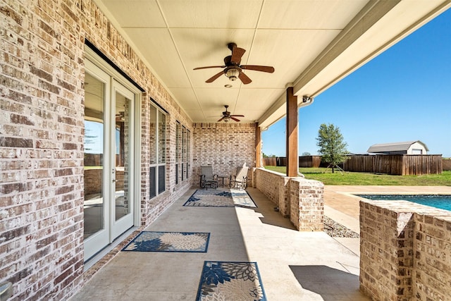 view of patio with ceiling fan