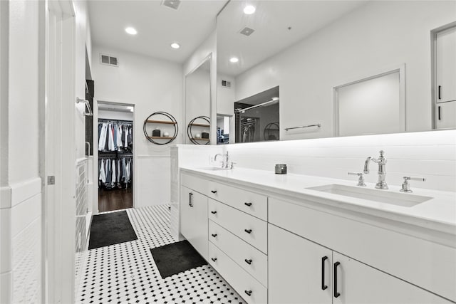 bathroom featuring hardwood / wood-style floors and vanity