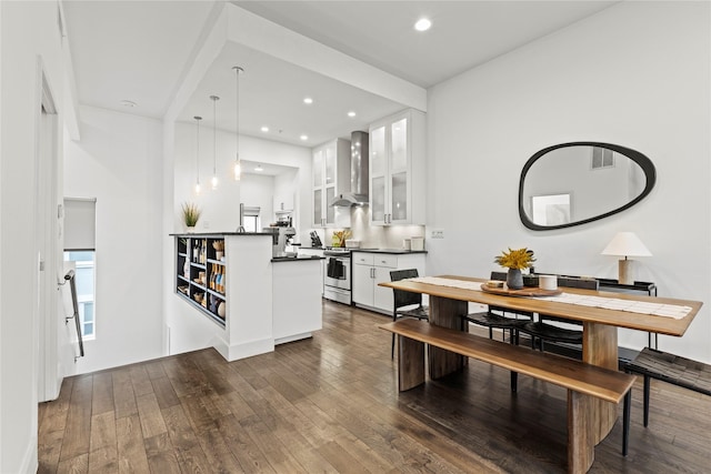 dining space with dark wood-type flooring