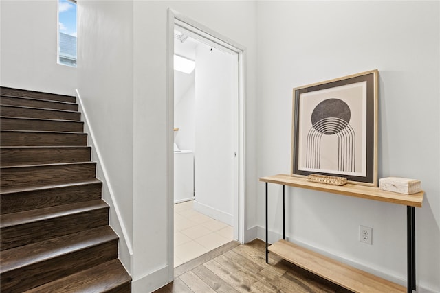 stairway with wood-type flooring