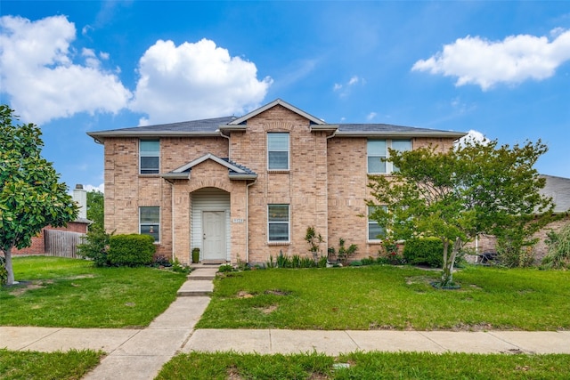 view of front property featuring a front lawn