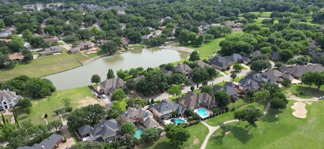 drone / aerial view with a water view