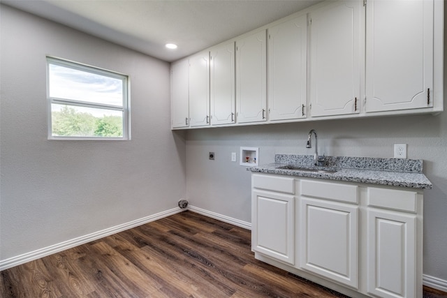 washroom featuring cabinets, dark wood-type flooring, washer hookup, electric dryer hookup, and sink