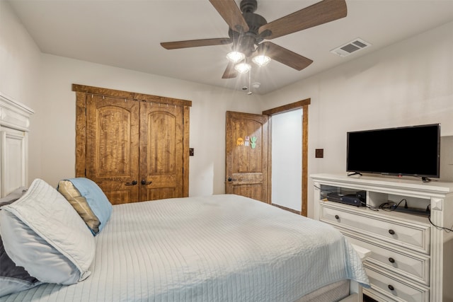 bedroom with a closet and ceiling fan