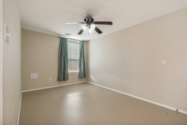 unfurnished room with concrete floors and ceiling fan