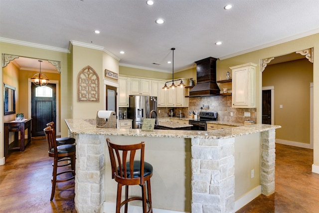 kitchen featuring pendant lighting, stainless steel appliances, light stone counters, and custom exhaust hood