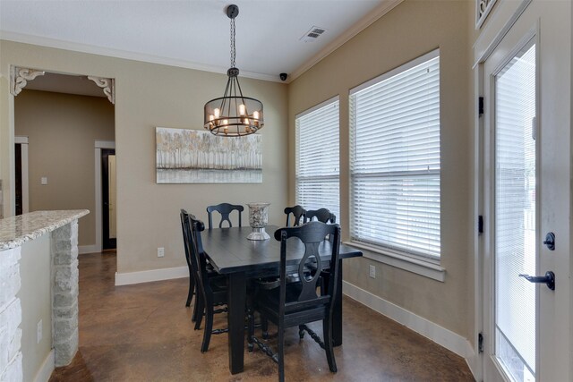 dining space with a notable chandelier and crown molding