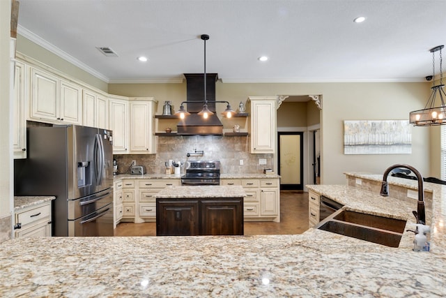 kitchen featuring light stone countertops, appliances with stainless steel finishes, ornamental molding, sink, and pendant lighting