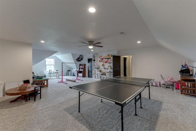 game room with carpet floors, ceiling fan, and lofted ceiling