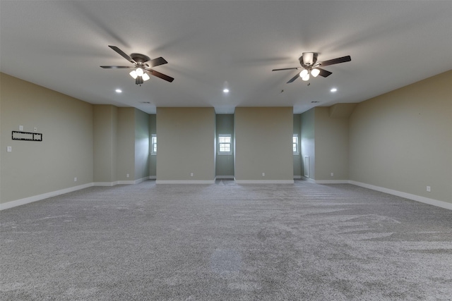 carpeted empty room with ceiling fan