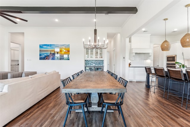 dining area featuring ceiling fan with notable chandelier, ornamental molding, beam ceiling, and dark hardwood / wood-style floors