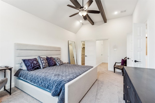 bedroom featuring light carpet, ceiling fan, and vaulted ceiling with beams