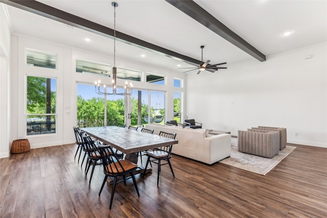 dining area featuring ceiling fan with notable chandelier, dark hardwood / wood-style flooring, and beamed ceiling