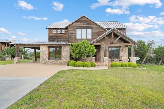 view of front of home featuring a carport and a front yard