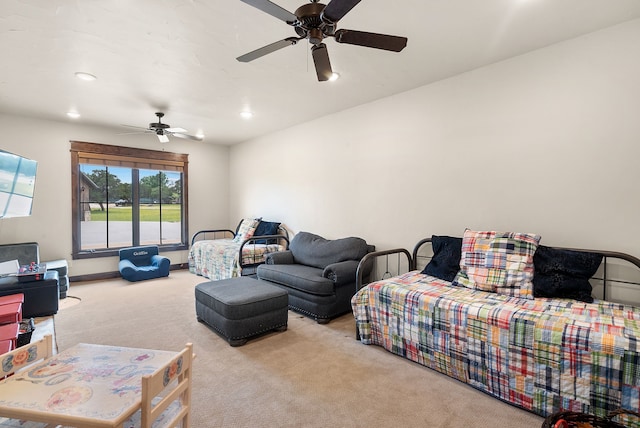 bedroom with light colored carpet and ceiling fan