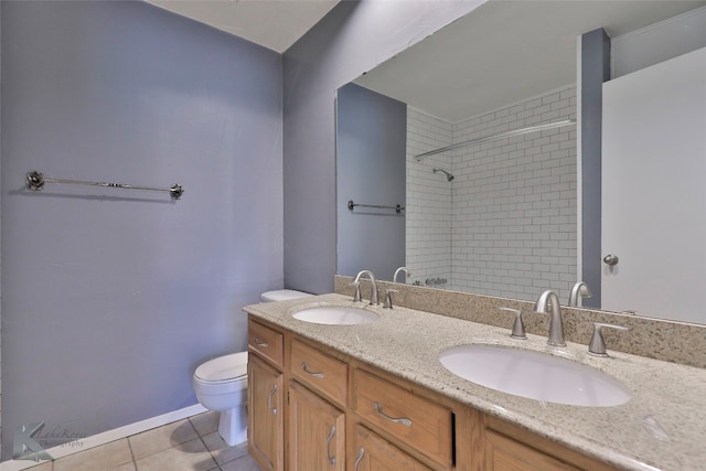 bathroom featuring dual sinks, vanity with extensive cabinet space, toilet, and tile floors