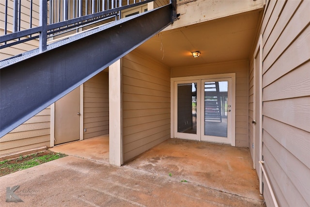 doorway to property with a patio