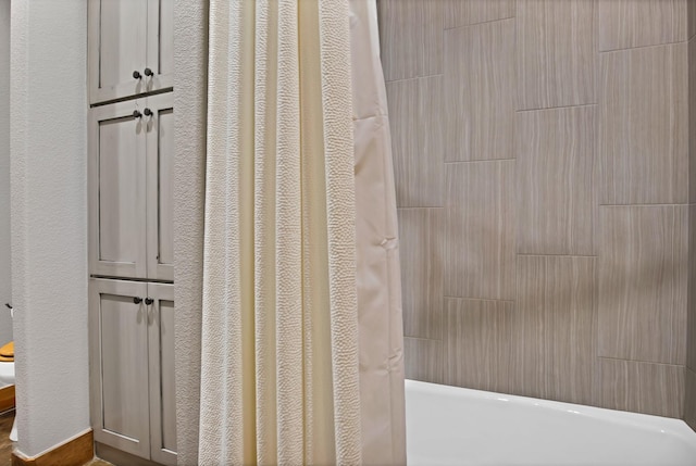 205 Haciendas Dr, Weatherford, TX 76087 - bathroom view of shower / bath combination with curtain