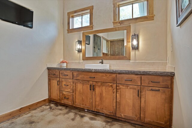 205 Haciendas Dr, Weatherford, TX 76087 - bathroom with baseboards and vanity