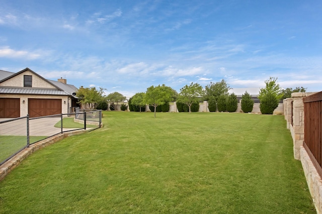 205 Haciendas Dr, Weatherford, TX 76087 - view of yard with a garage and driveway