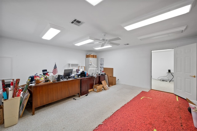 carpeted office with ceiling fan