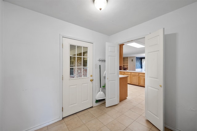 interior space featuring light tile patterned flooring