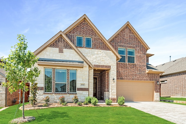 craftsman inspired home with a garage and a front lawn