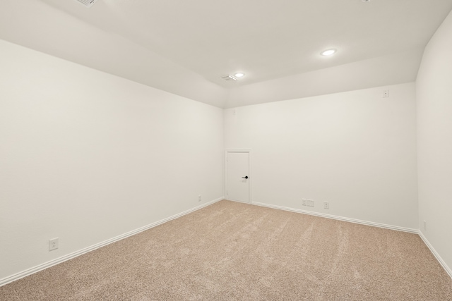 spare room featuring carpet