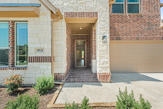 property entrance with a garage