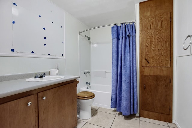 full bathroom featuring toilet, shower / bath combo with shower curtain, vanity, and tile patterned flooring