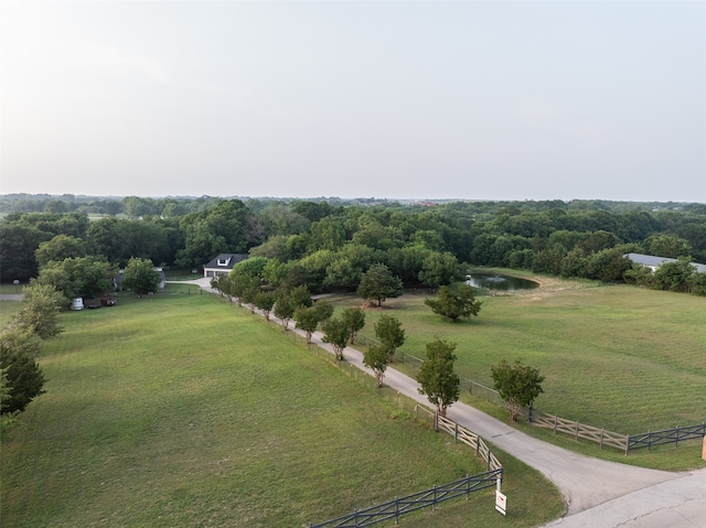 bird's eye view with a water view and a rural view