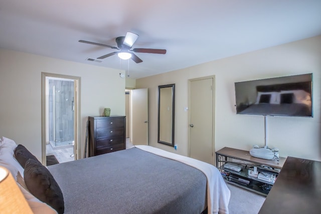 bedroom featuring carpet flooring, ceiling fan, and ensuite bathroom