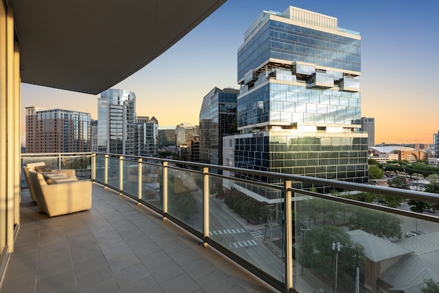 view of balcony at dusk