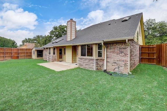 back of property featuring a patio and a lawn