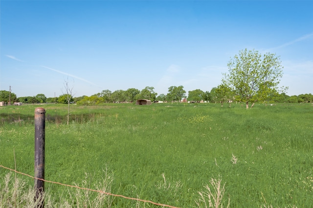 view of yard featuring a rural view