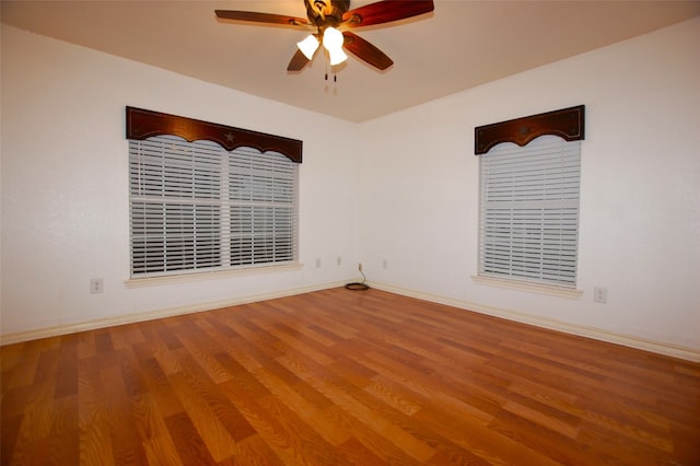 washroom with washer and clothes dryer, cabinets, and light tile floors