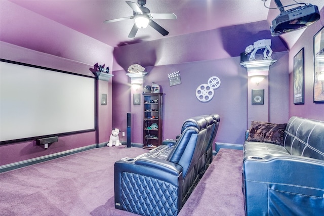 cinema featuring light colored carpet and ceiling fan