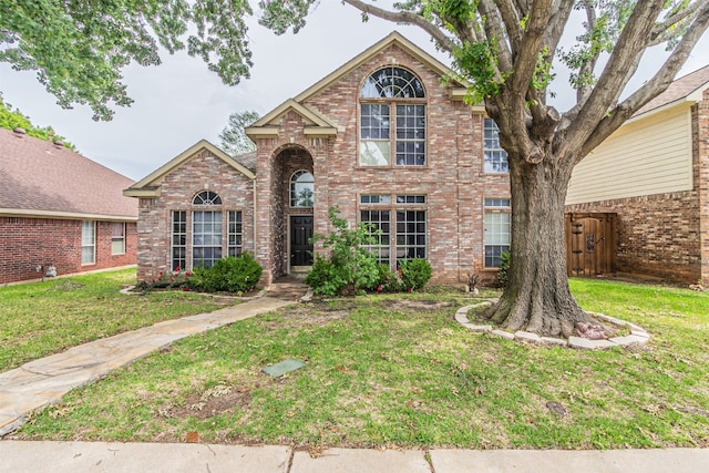 view of front of home with a front lawn